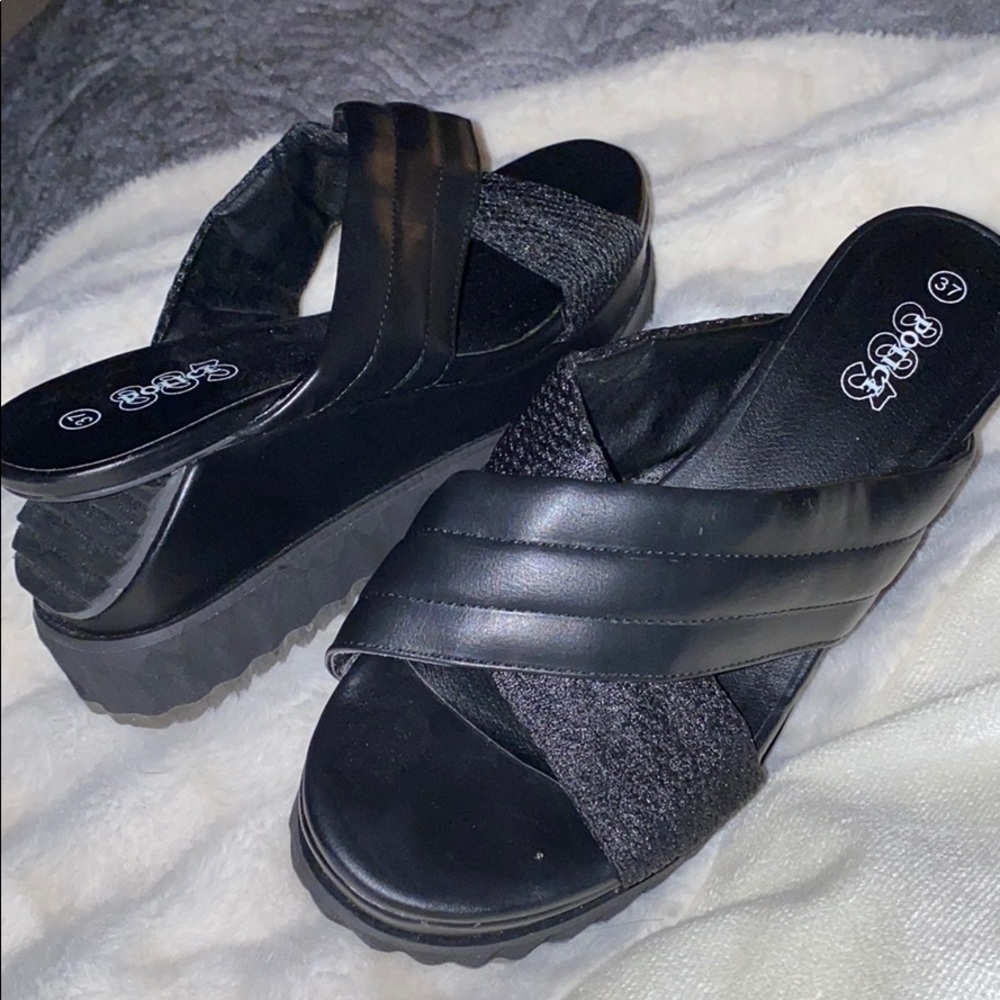 Designer Black platform shoes in black leather